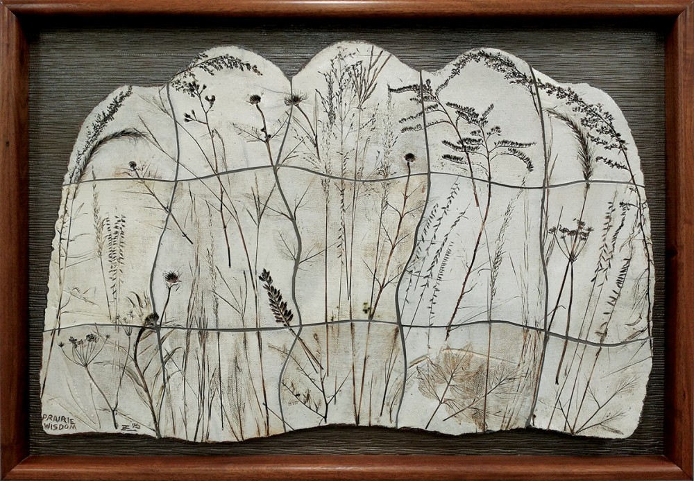 sculpture of impressions of plants from the tallgrass prairie
